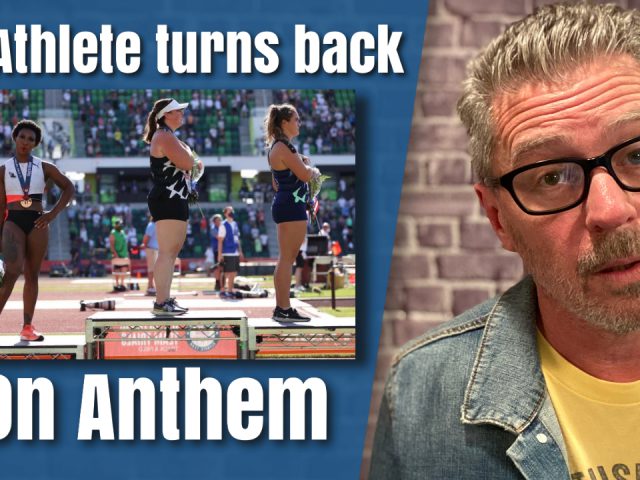 US Athlete Turns Back on National Anthem