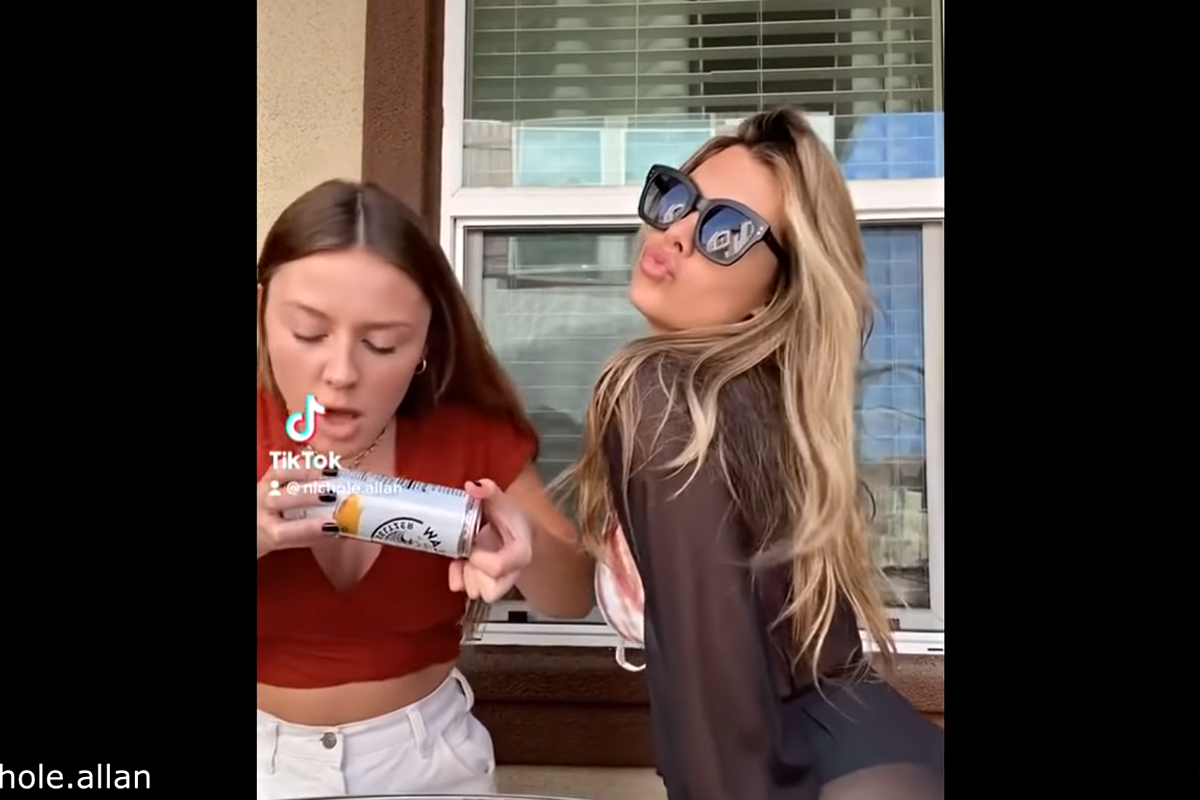Model Takes Can Spray to Face. Always Funny. Always.
