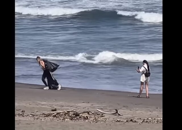 She pretends to clean the beach for photos, then leaves the trash! (video)