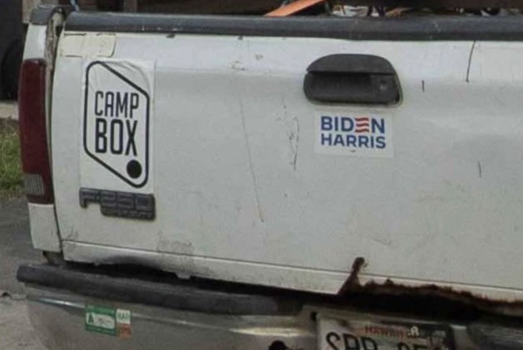 Media scrambles to decipher mysterious writing of Bumper Sticker on truck of alleged shooter.